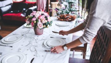 Canva - Woman Preparing Christmas Table