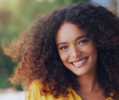 Now is a good time to enjoy life. Cropped shot of a beautiful young woman standing outdoors.