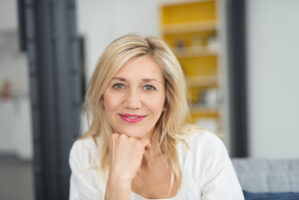 Attractive woman looking pensively at the camera