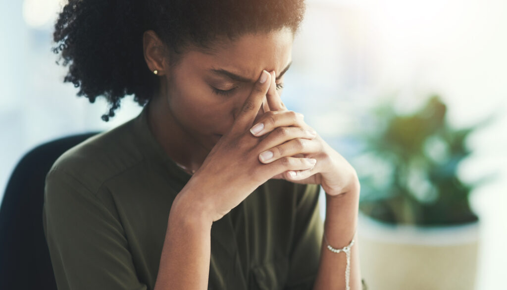 Burnout, stress and business woman in office with problem, mistake and working on deadline. Headache, anxiety and African female worker with frustrated, stressed out and migraine thinking of solution