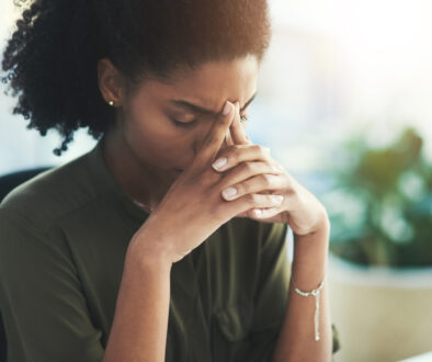 Burnout, stress and business woman in office with problem, mistake and working on deadline. Headache, anxiety and African female worker with frustrated, stressed out and migraine thinking of solution