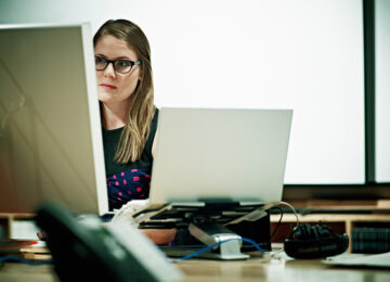 Woman behind computer