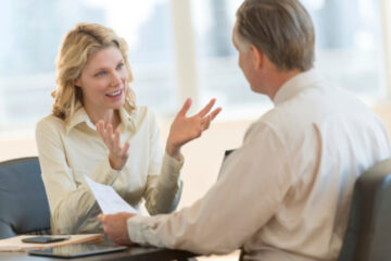 Woman talking with man