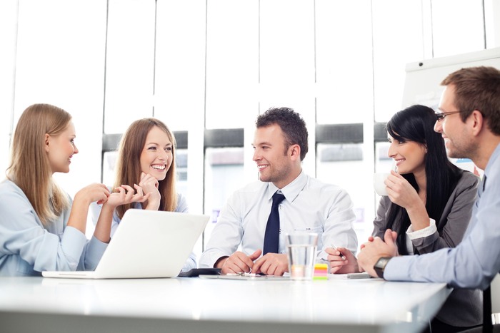 coed-group-at-table coed-group-at-table