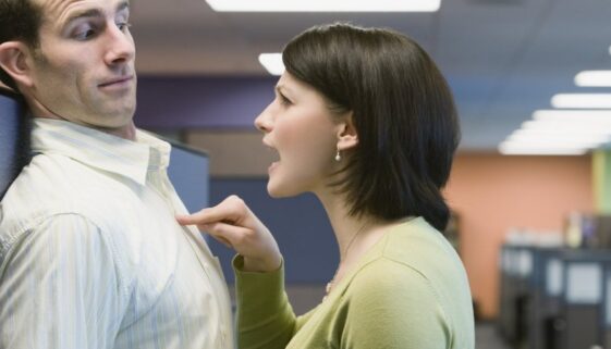 girl in guys face attitude