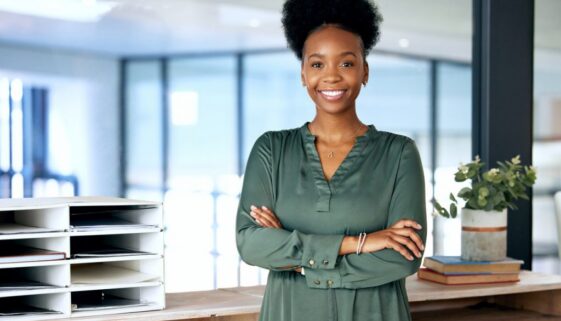 Shot of a young businesswoman standing in an office at work