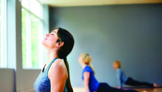 three-females-yoga-class-canyon-ranch-wellness-resort