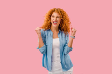 woman celebrating woman celebrating
