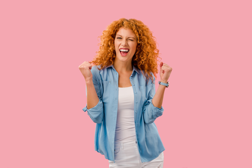 woman celebrating woman celebrating